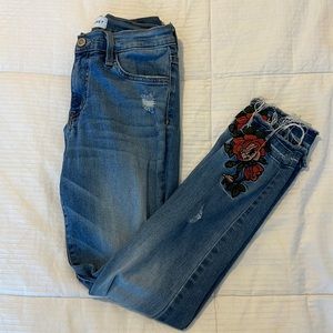 Distressed embroidered denim ankle jeans